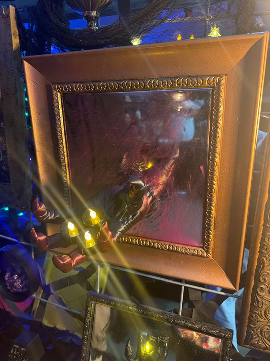 Tea light hand mirror